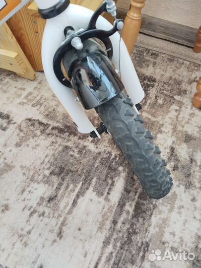 Детский четырёхколесный велосипед