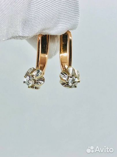Золотые серьги с камнем