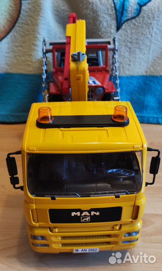 Машина эвакуатор с внедорожником Bruder