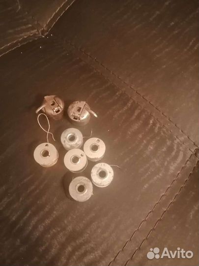 Шпульки, челноки, игольная пластина