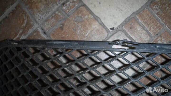 Решетка в бампер центральная Mitsubishi Lancer 10