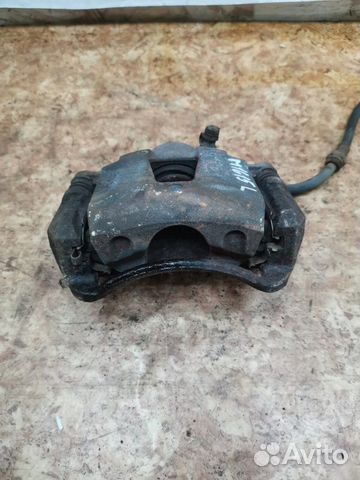 Суппорт тормозной передний левый Chevrolet Lacetti