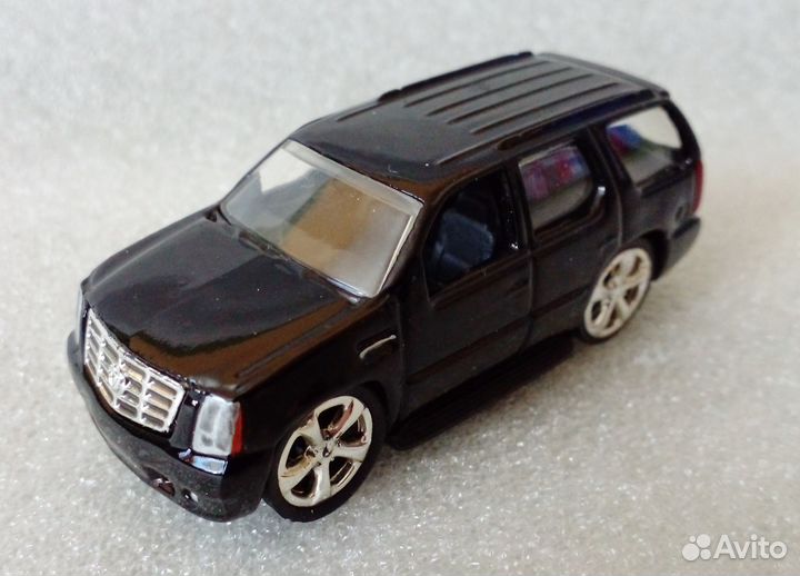 1/64 модели Cadillac