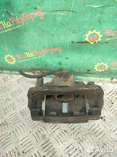 Суппорт передний левый Mazda 626 GF 1.8 Л 1993