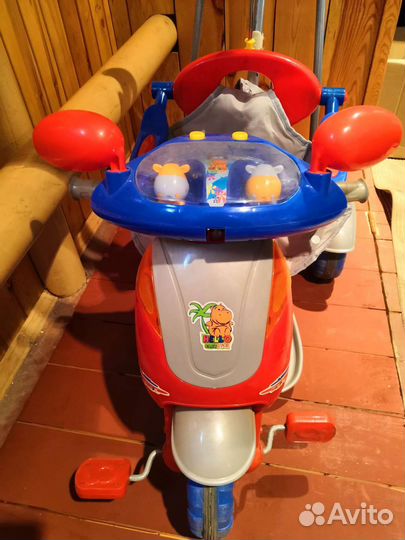 Велосипед-коляска музыкальный трёхколёсный
