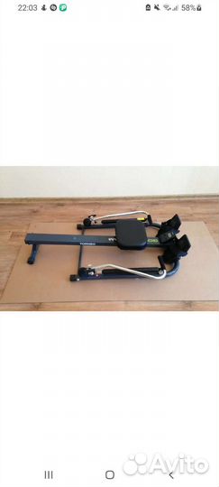 Гребной тренажер