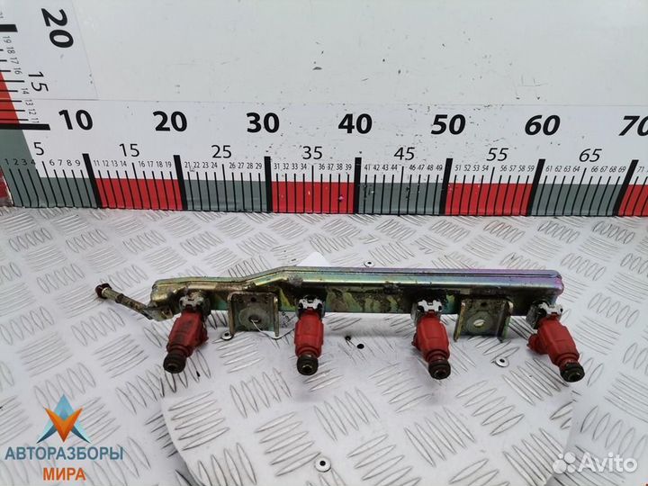 Форсунка Nissan Almera N16 рест. 2004 166009F600