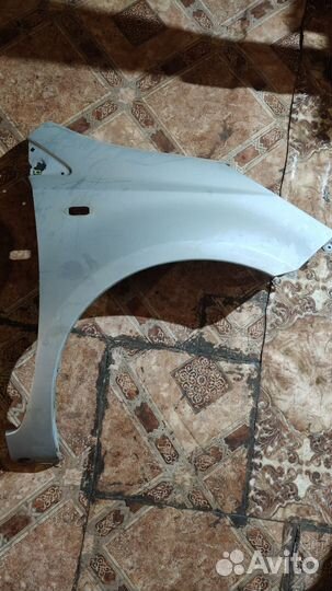 Крыло переднее правое