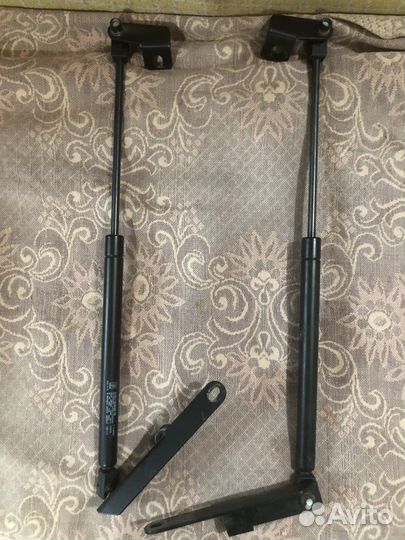 Продам амортизаторы капота lancer 10
