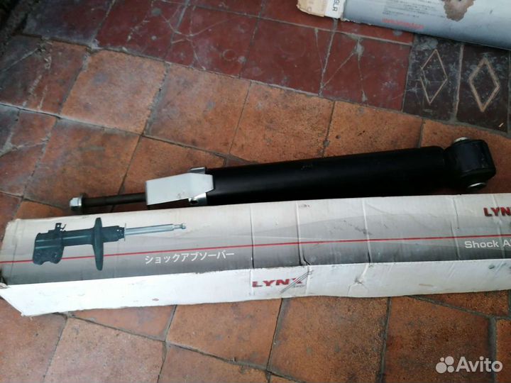 Задние амортизаторы