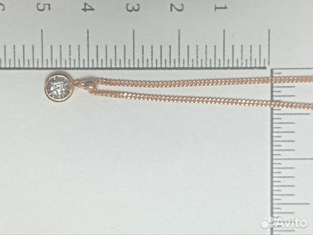 Золотое колье с камнем