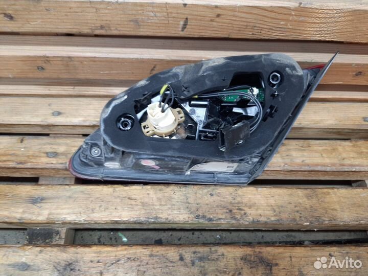 Фонарь крышки багажника левый Opel Astra J GTC