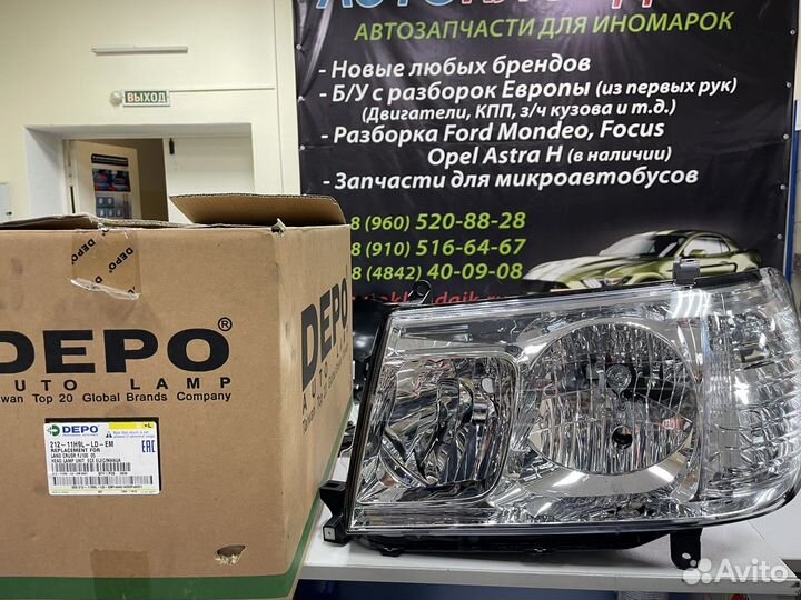 Фара левая Toyota Land Cruiser 100 212-11H9L-LD-EM