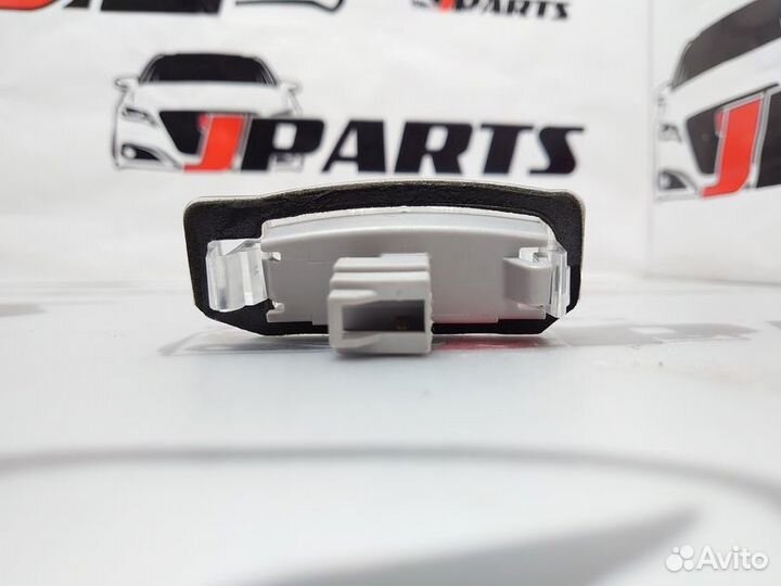 Фонарь подсветки номера Mitsubishi Outlander XL