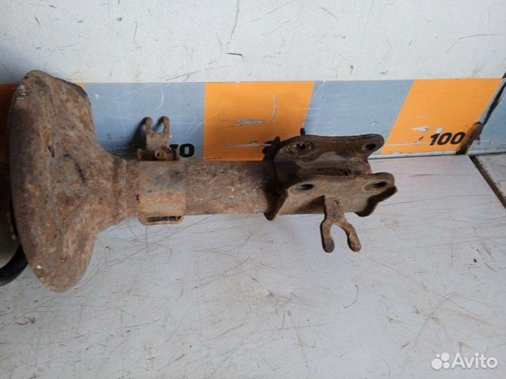 Амортизатор передний левый Chevrolet Aveo T250 1.2