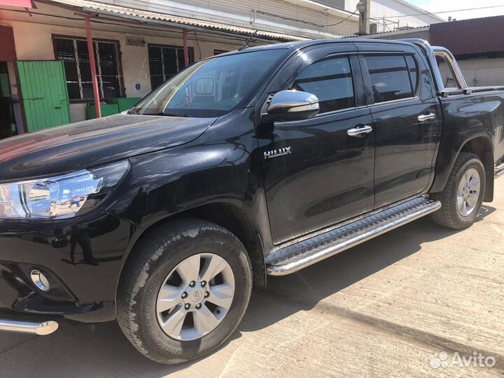 Пороги с накладным листом 53 мм Toyota Hilux 2010