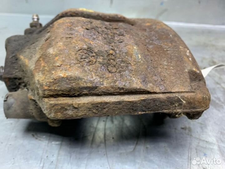 Суппорт тормозной передний левый Skoda Octavia (A5