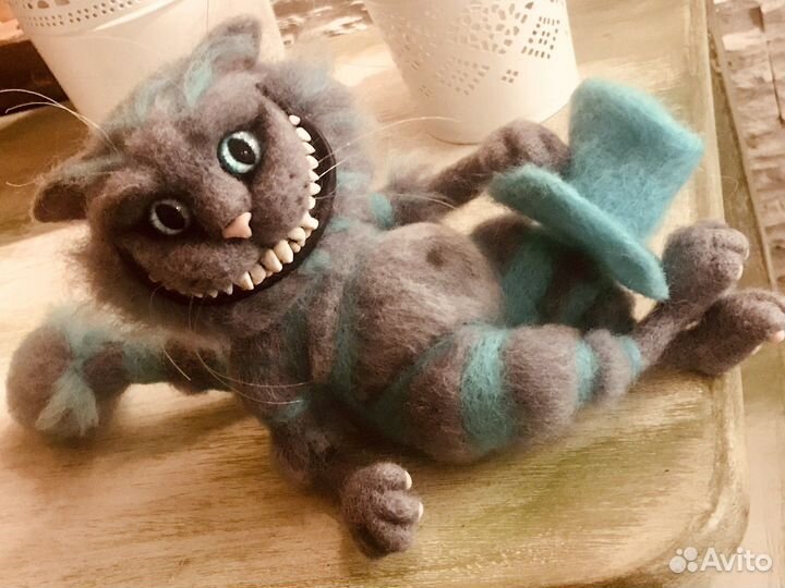 Чеширский кот из Асилы в стране Чудес