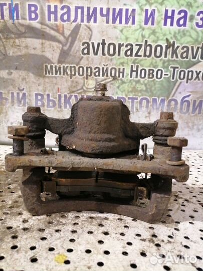 Суппорт задний правый Mazda Xedos 9