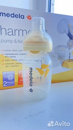 Молокоотсос medela ручной + смартсоска calma