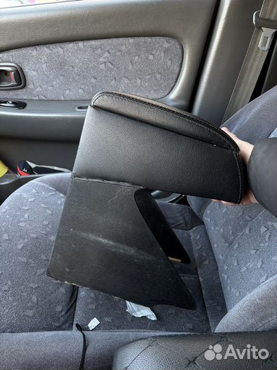 Подлокотник на kia spectra