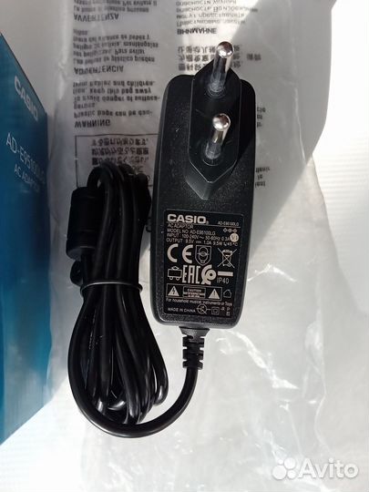 Блок питания Casio 9.5V 1A AD-E95100L новый ориг