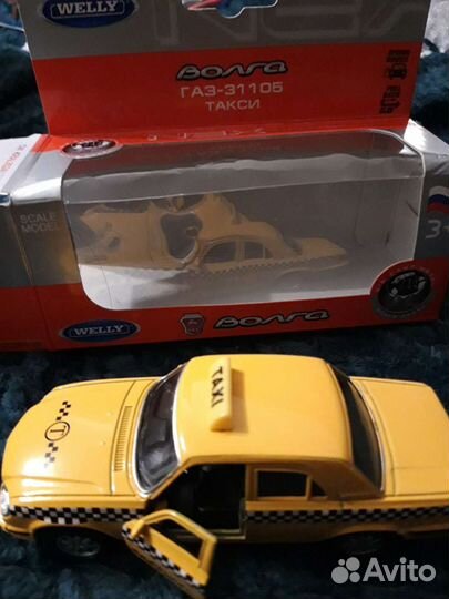 Коллекционная машина Welly такси Волга Газ -31105