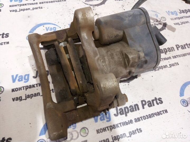 Суппорт тормозной задний правый Volkswagen Tiguan