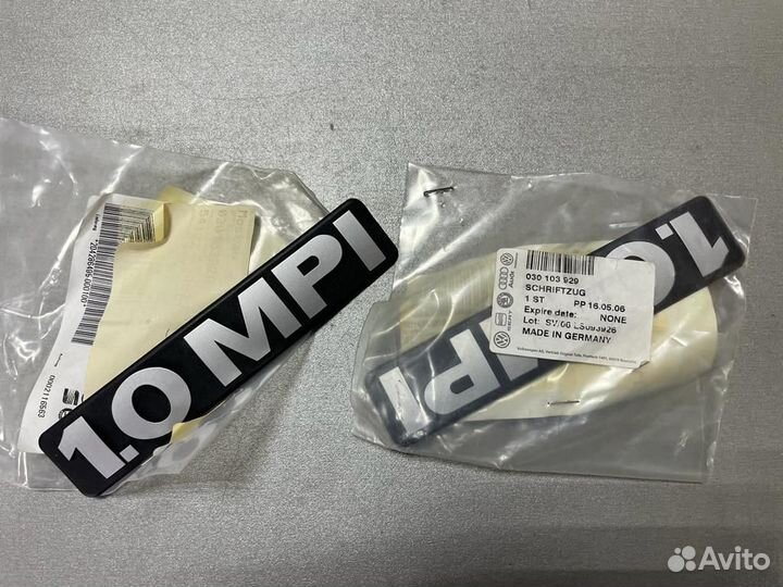 Надпись VW 1.0 MPI 030 103 929