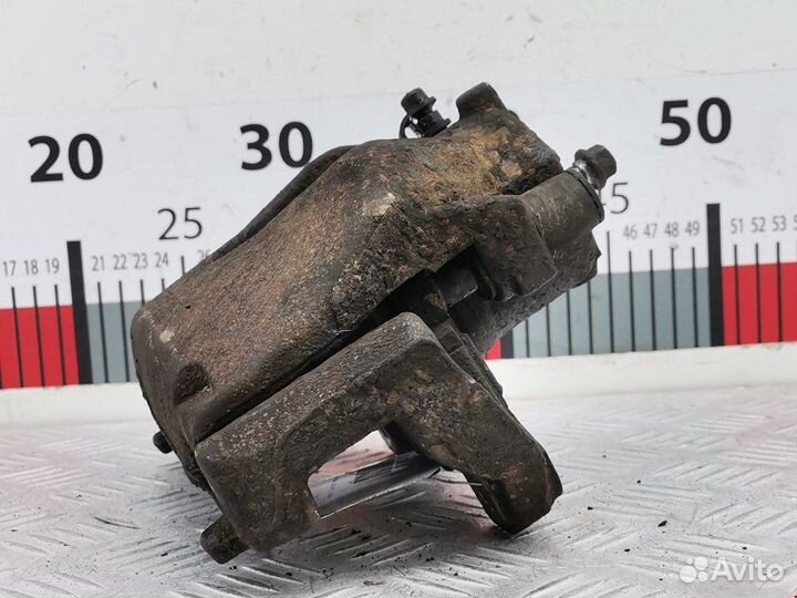 Суппорт передний правый для Opel Zafira B 95520047