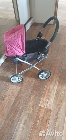 Игрушечная коляска для кукол