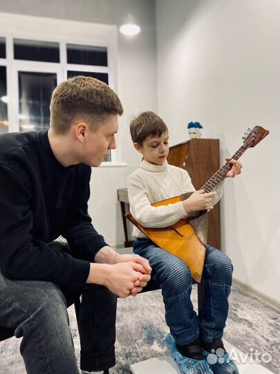 Обучение игре на балалайке