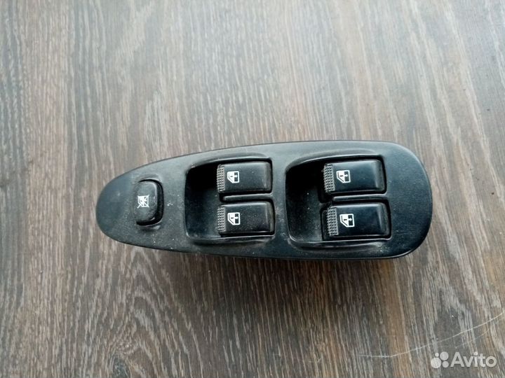 Блок управления стеклоподьемниками Kia Spectra