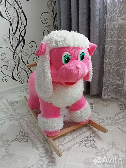 Собака качалка