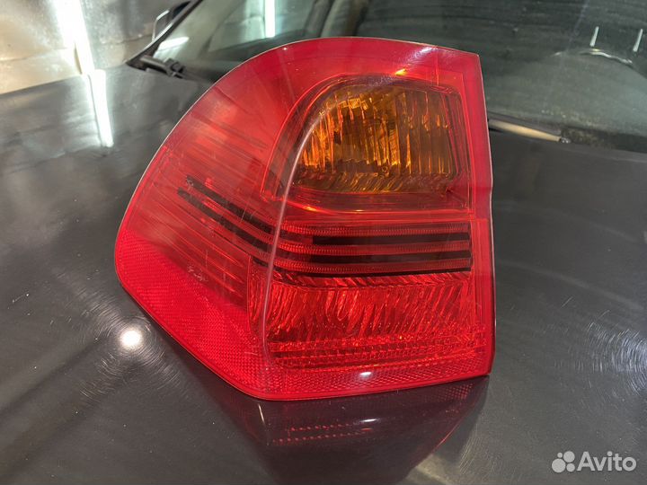 Левый фонарь bmw e91