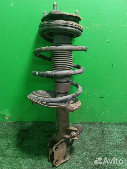 Стойка амортизатора передняя левая KIA ceed (ED)