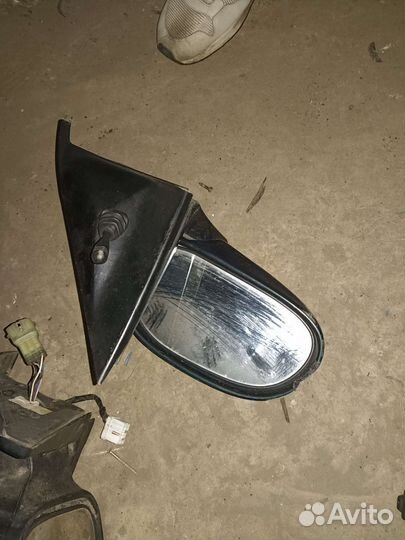 Зеркало левое Kia clarus 1