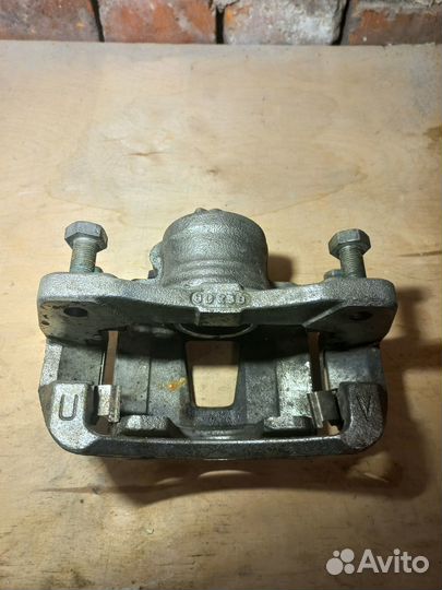 Суппорт тормозной левый Chevrolet Lachetti (J200)