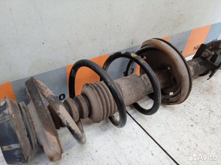 Амортизатор передний Nissan Almera G15 1.6 2014