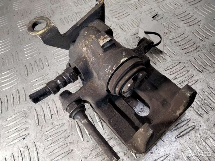 Суппорт задний левый Ford Focus 1