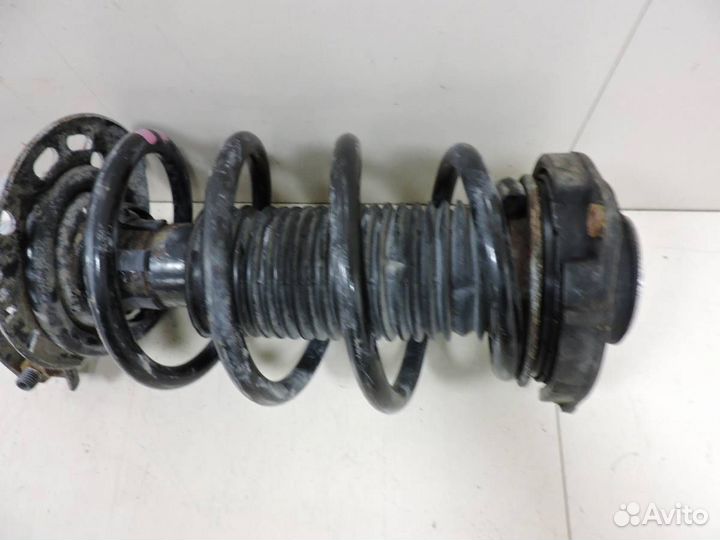 Амортизатор передний левый Skoda Yeti 2009