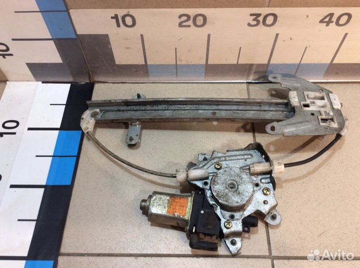 Стеклоподъемник электрический задний левый Nissan