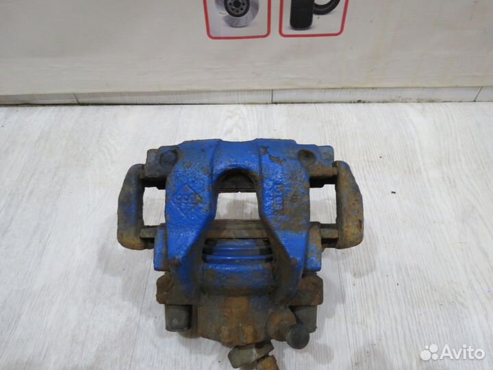 Суппорт тормозной передний Renault Sandero 2