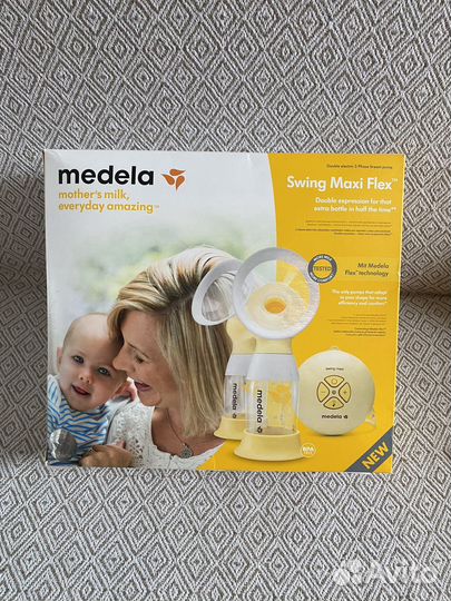 Молокоотсос medela swing maxi flex