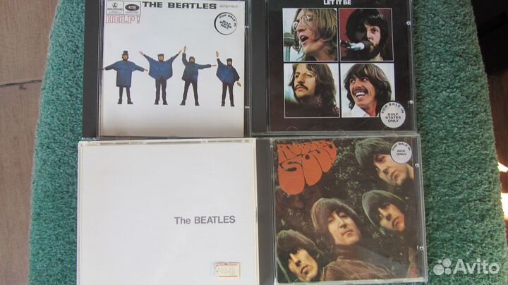 Четыре лецинзионных сд диска THE beatles