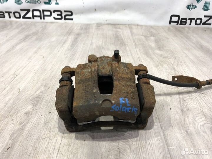 Суппорт тормозной передний левый Hyundai Solaris