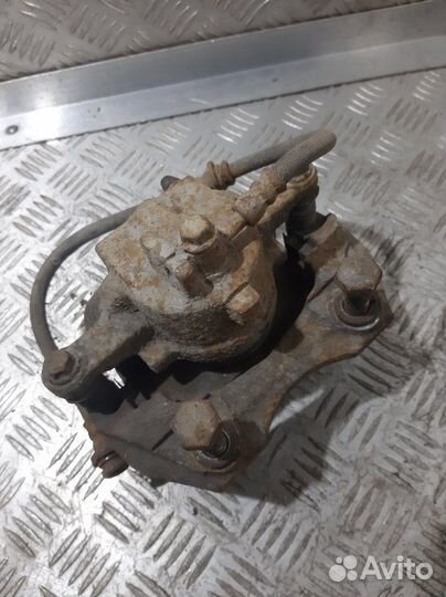 Суппорт передний правый Nissan Almera N16 QG15DE