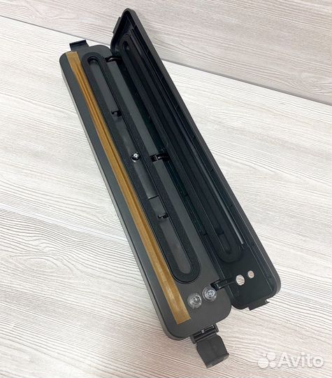 Вакуумный упаковщик