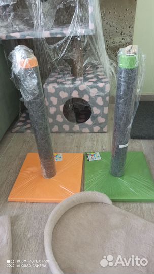 Когтеточки и домики для кошек