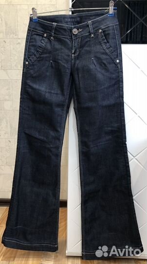 Джинсы клеш от бедра 42-44